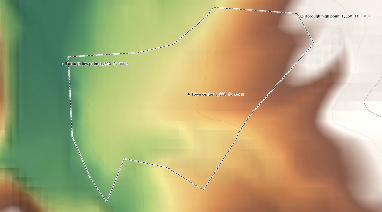 Topographic elevation map of Youngstown, Pennsylvania, shaded from 1,010 ft on the west side to 1,150 ft at the foot of the Laurel Hill