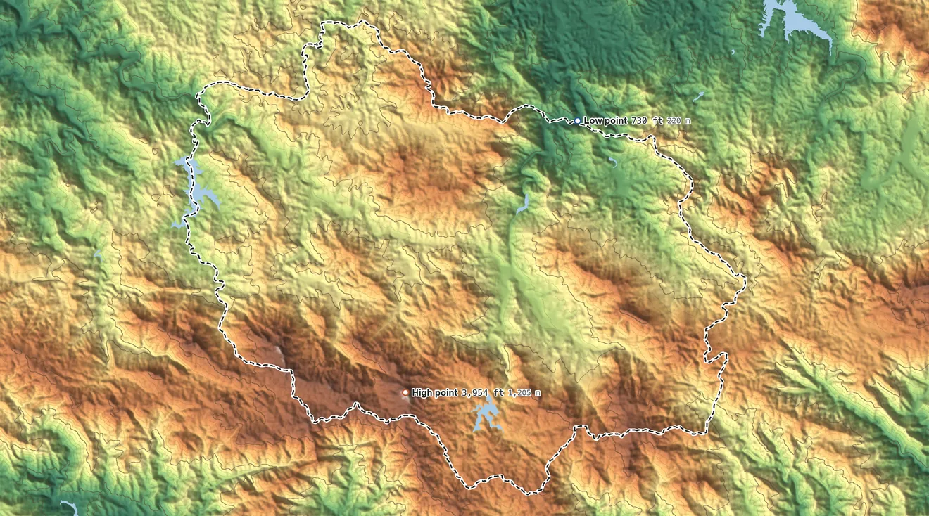 Topographic elevation map of Adjuntas Municipio, Puerto Rico, shaded from 730 ft on the northeast side to 3,954 ft on Monte Guilarte