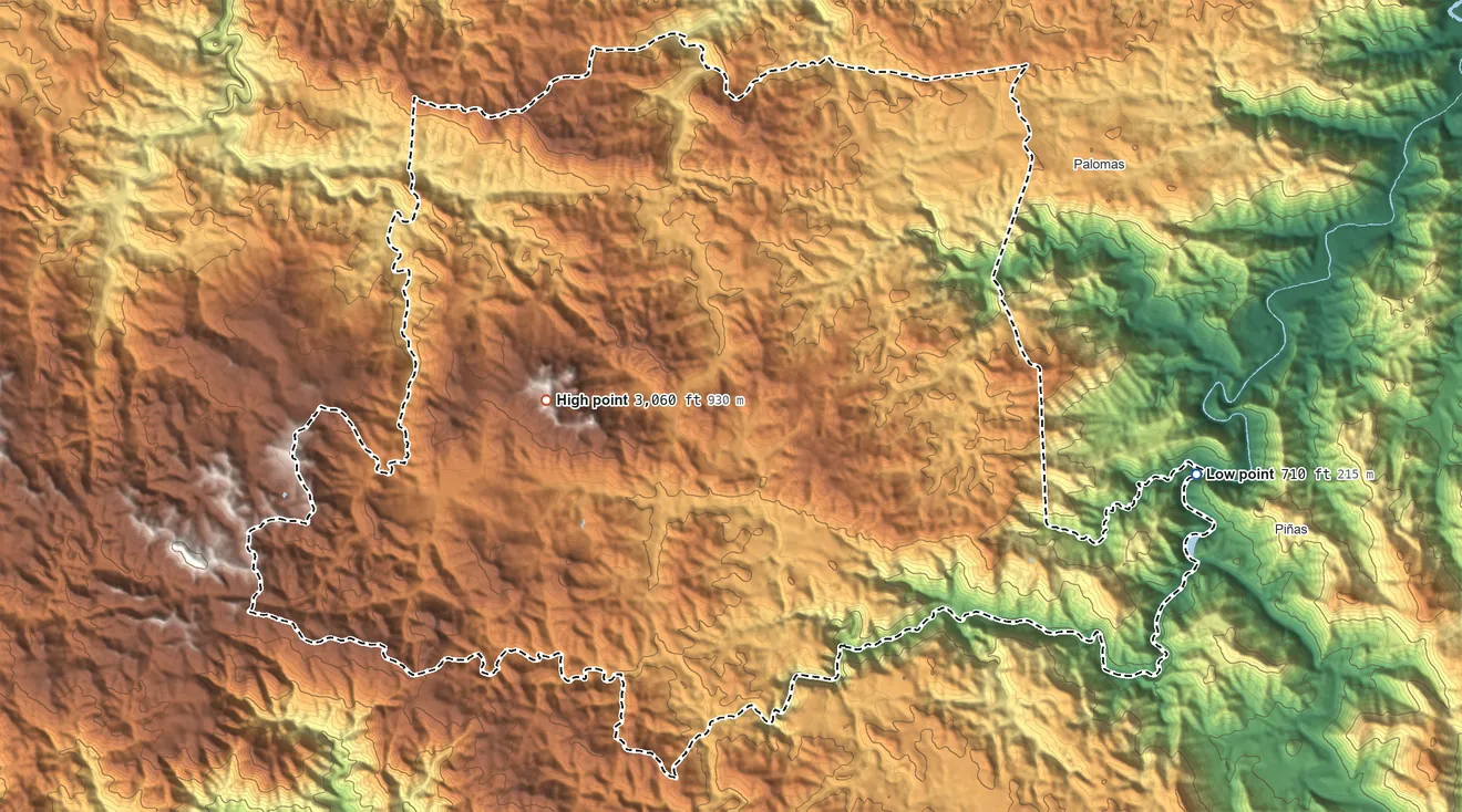 Topographic elevation map of Barranquitas Municipio, Puerto Rico, shaded from 710 ft on the east side to 3,060 ft on La Torrecilla