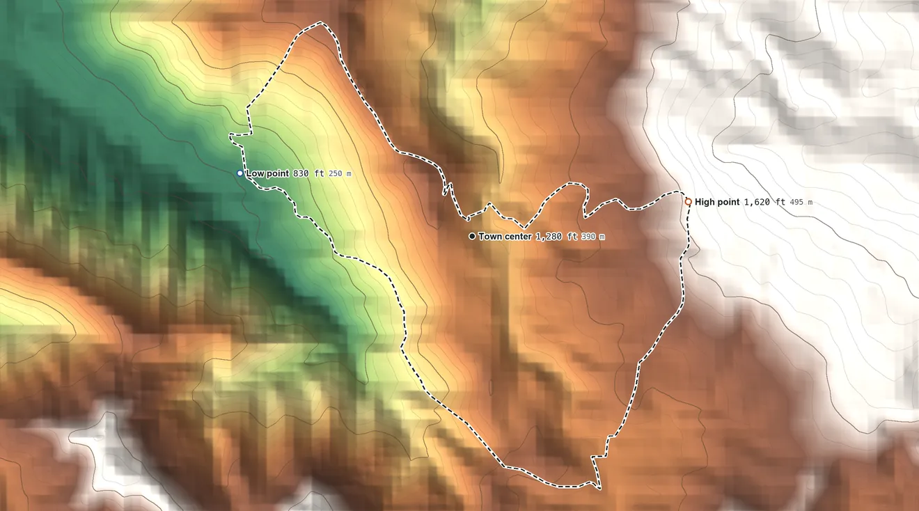 Topographic elevation map of Benítez, Puerto Rico, shaded from 830 ft on the west side to 1,620 ft at the foot of the Sierra de Luquillo