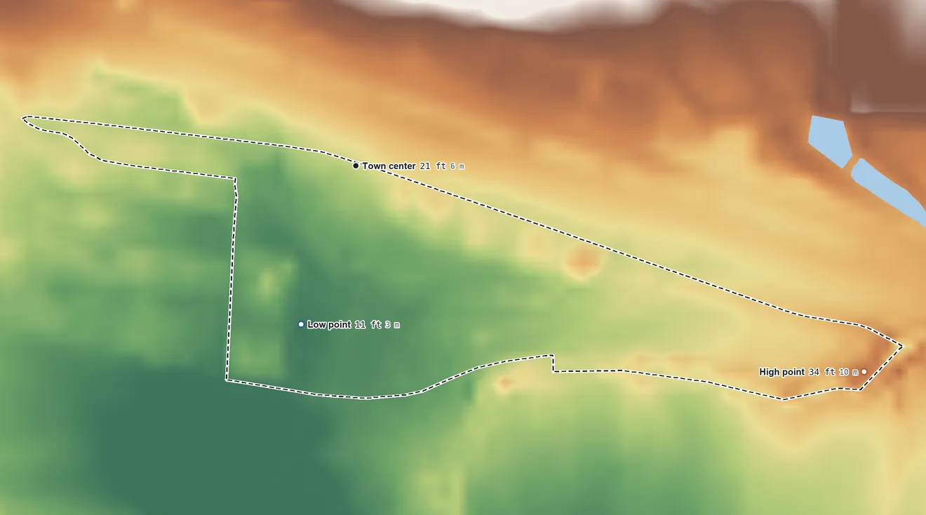 Topographic elevation map of Calzada, Puerto Rico, shaded from 11 ft on the south side to 34 ft on the east side