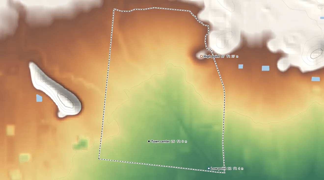 Topographic elevation map of Coquí, Puerto Rico, shaded from 12 ft on the southeast side to 87 ft at the foot of the Sierra de Jájome