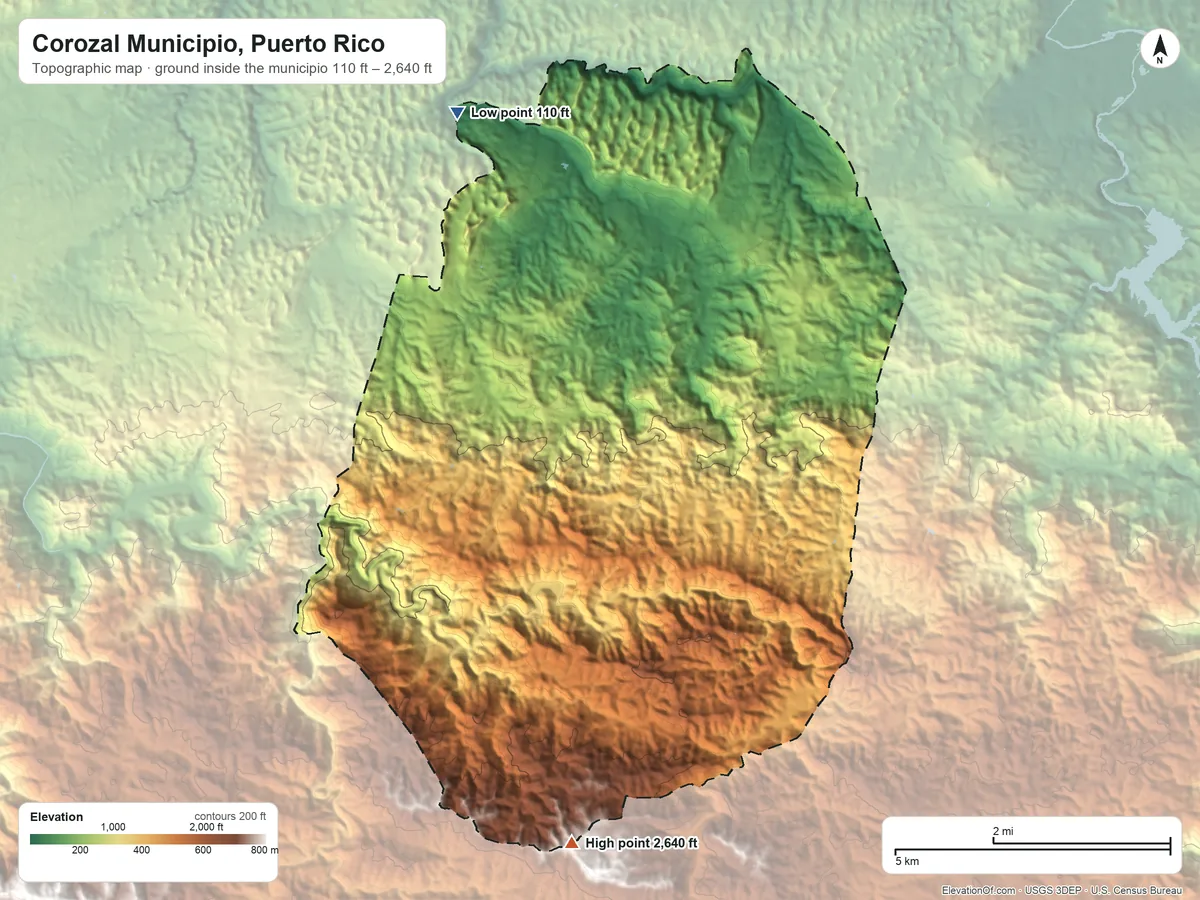 Topographic elevation map of Corozal Municipio, Puerto Rico, shaded from 110 ft on the northwest side to 2,640 ft on the south side