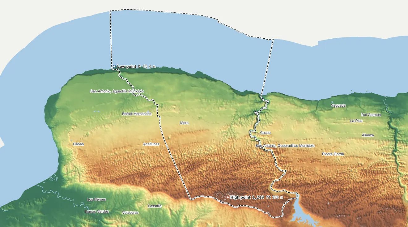 Topographic elevation map of Isabela Municipio, Puerto Rico, shaded from sea level on the Océano Atlántico to 1,210 ft on the south side