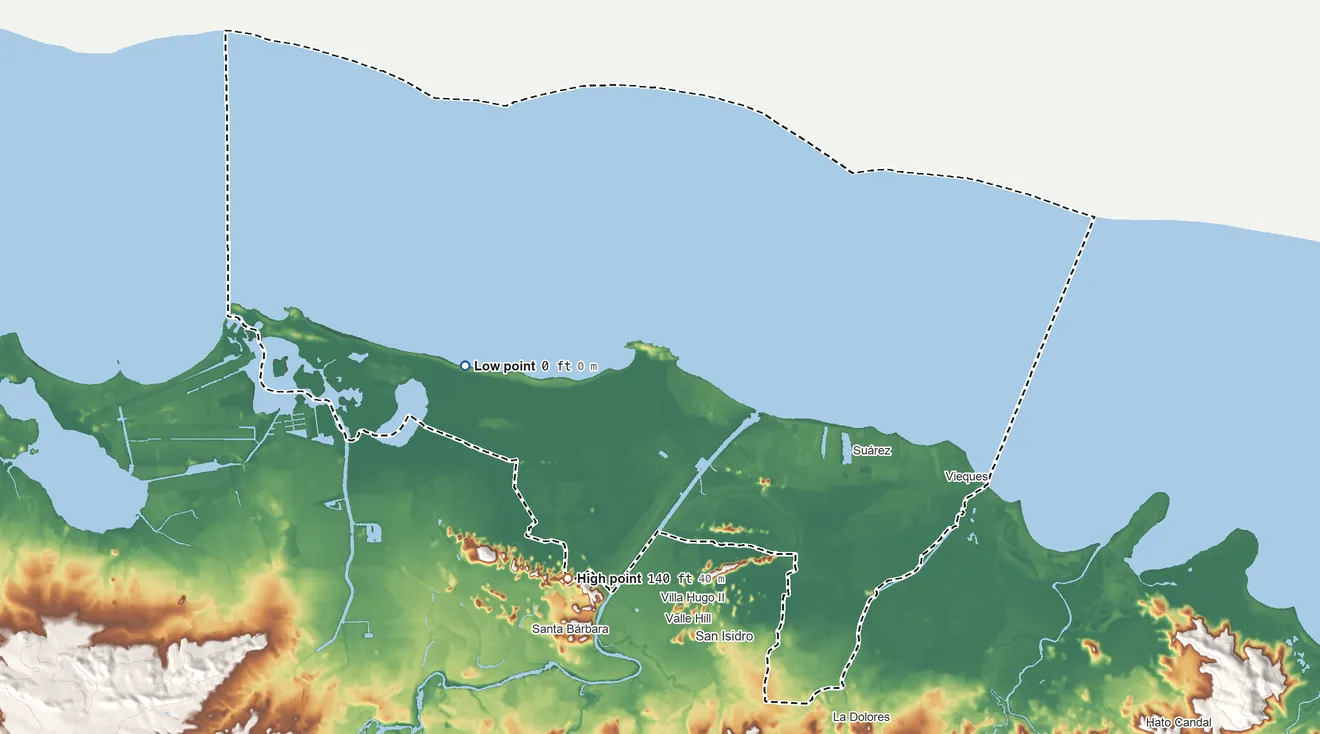Topographic elevation map of Loíza Municipio, Puerto Rico, shaded from sea level on the Océano Atlántico to 140 ft on the southwest side