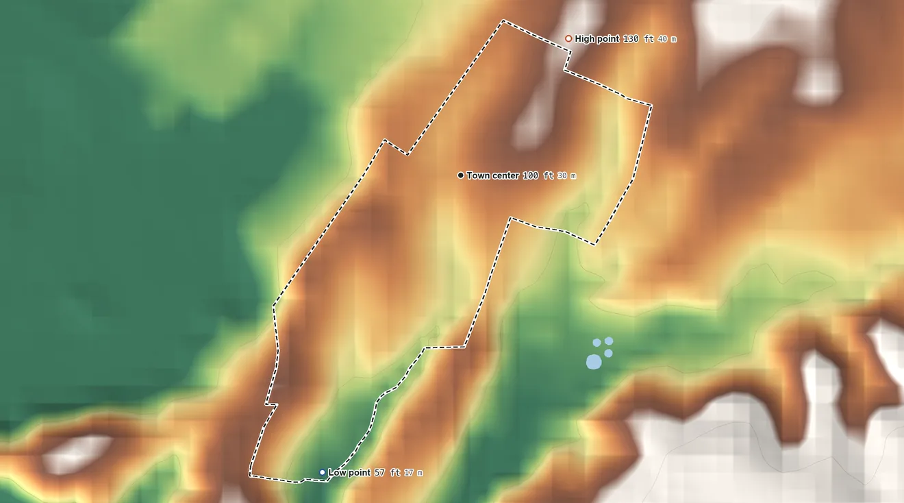 Topographic elevation map of Los Héroes, Puerto Rico, shaded from 57 ft on the southwest side to 130 ft at the foot of the Cordillera Jaicoa