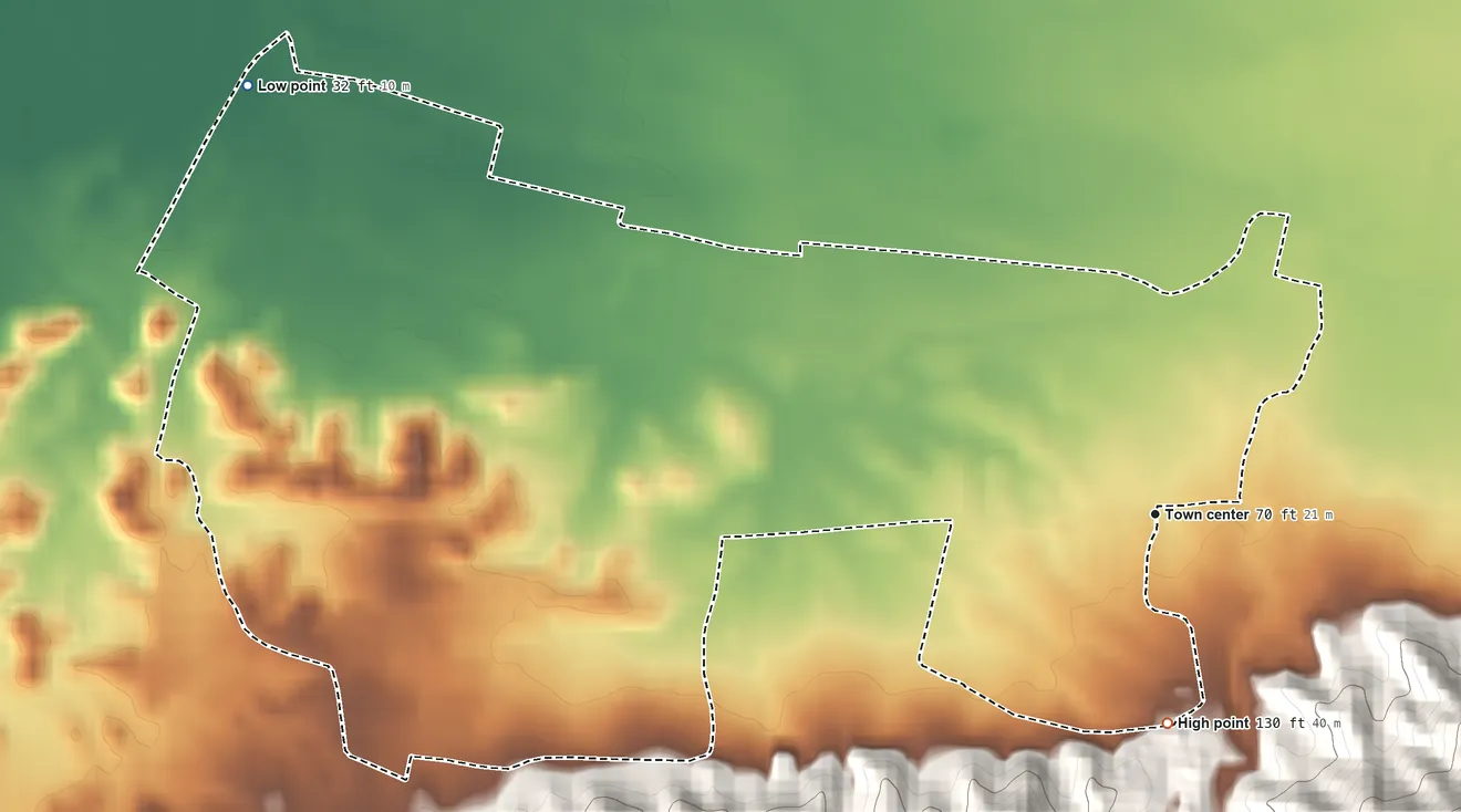 Topographic elevation map of Monte Grande, Puerto Rico, shaded from 32 ft on the northwest side to 130 ft at the foot of the Cordillera Sabana Alta