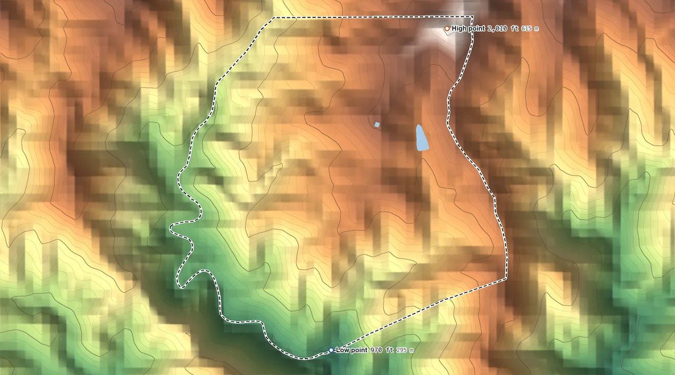 Topographic elevation map of Monte Verde, Puerto Rico, shaded from 970 ft on the south side to 2,010 ft at the foot of the Montes de Barina