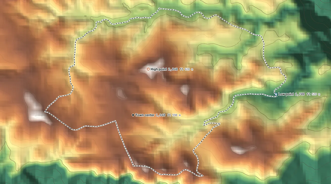 Topographic elevation map of Palomas, Puerto Rico, shaded from 1,700 ft on the east side to 2,040 ft on the north side