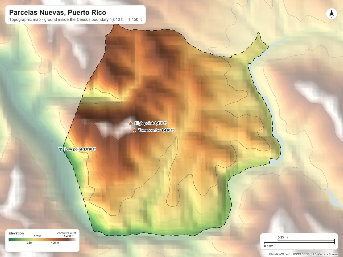 Topographic elevation map of Parcelas Nuevas, Puerto Rico, shaded from 1,010 ft on the west side to 1,450 ft at the foot of the Sierra de Jájome