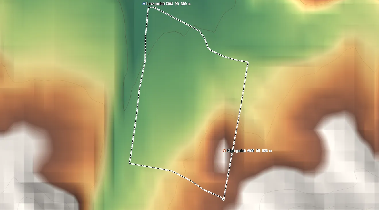Topographic elevation map of Parcelas Viejas Borinquen, Puerto Rico, shaded from 390 ft on the northwest side to 490 ft at the foot of the Sierra de Cayey