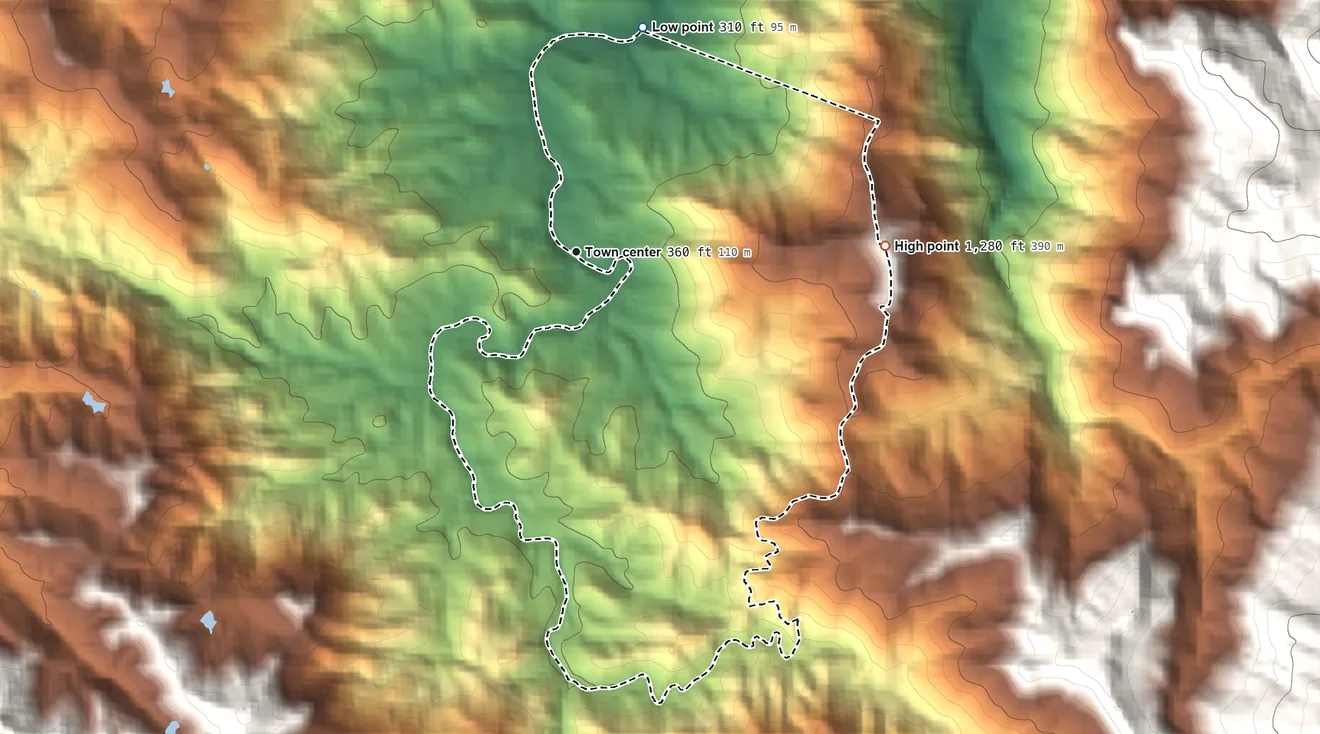 Topographic elevation map of Quebrada Prieta, Puerto Rico, shaded from 310 ft on the north side to 1,280 ft at the foot of the Sierra de Luquillo