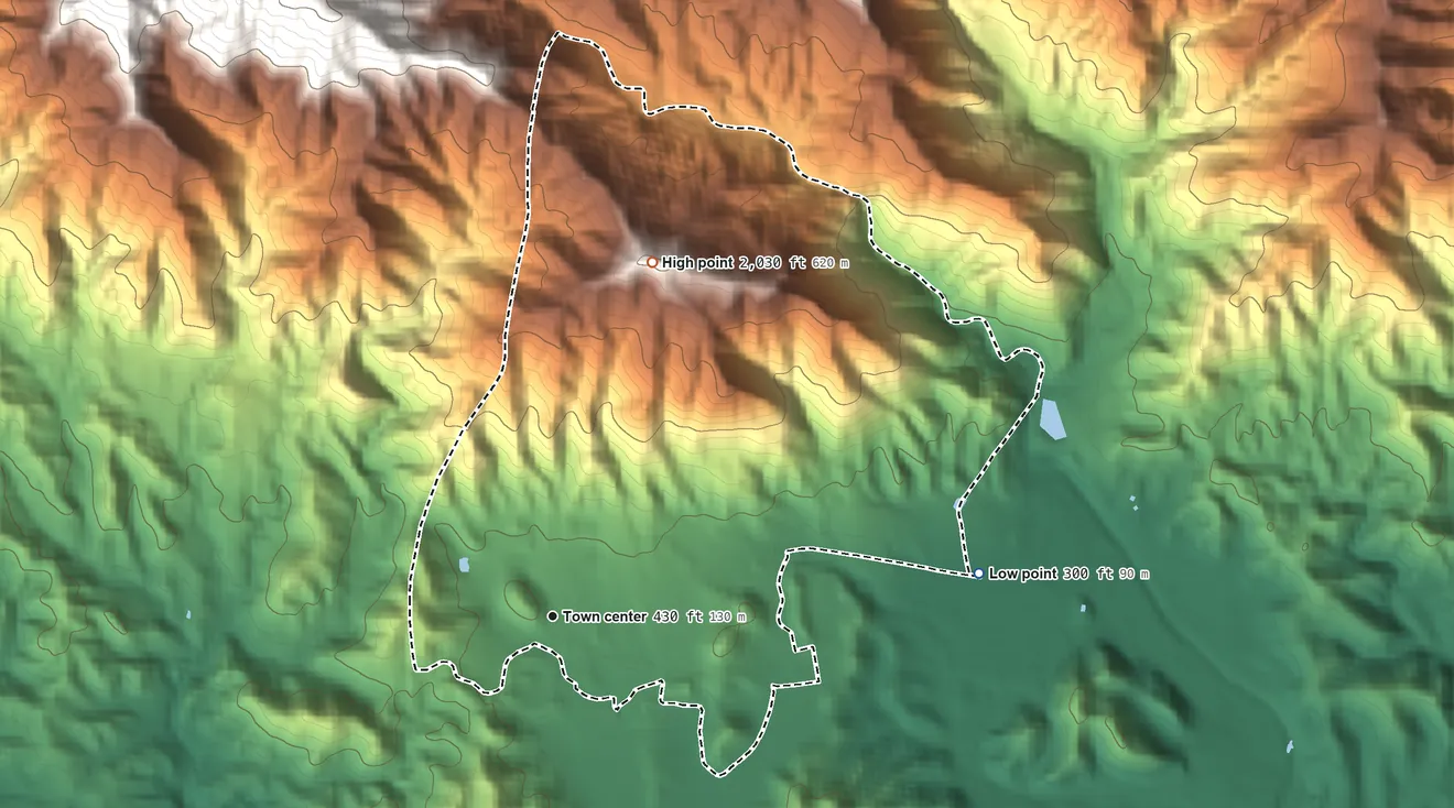 Topographic elevation map of Santo Domingo, Puerto Rico, shaded from 300 ft on the east side to 2,030 ft at the foot of the Montes de Barina