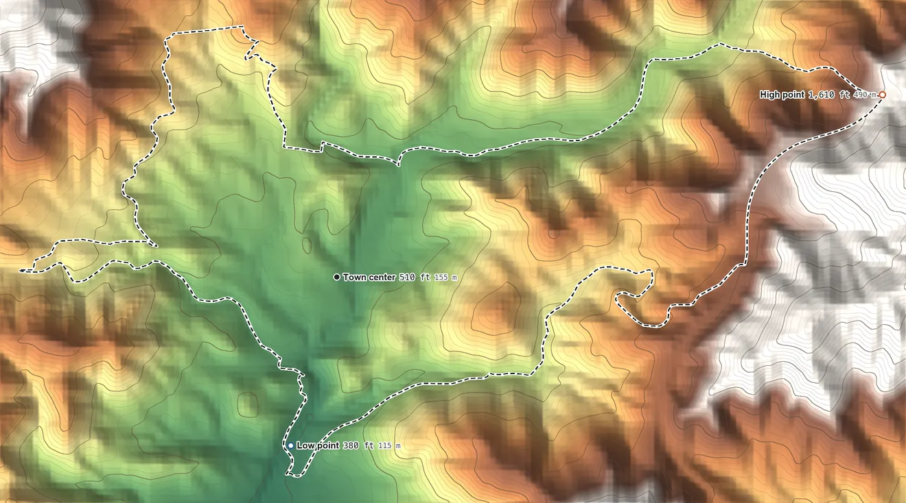 Topographic elevation map of Vázquez, Puerto Rico, shaded from 380 ft on the south side to 1,610 ft at the foot of the Sierra de Jájome