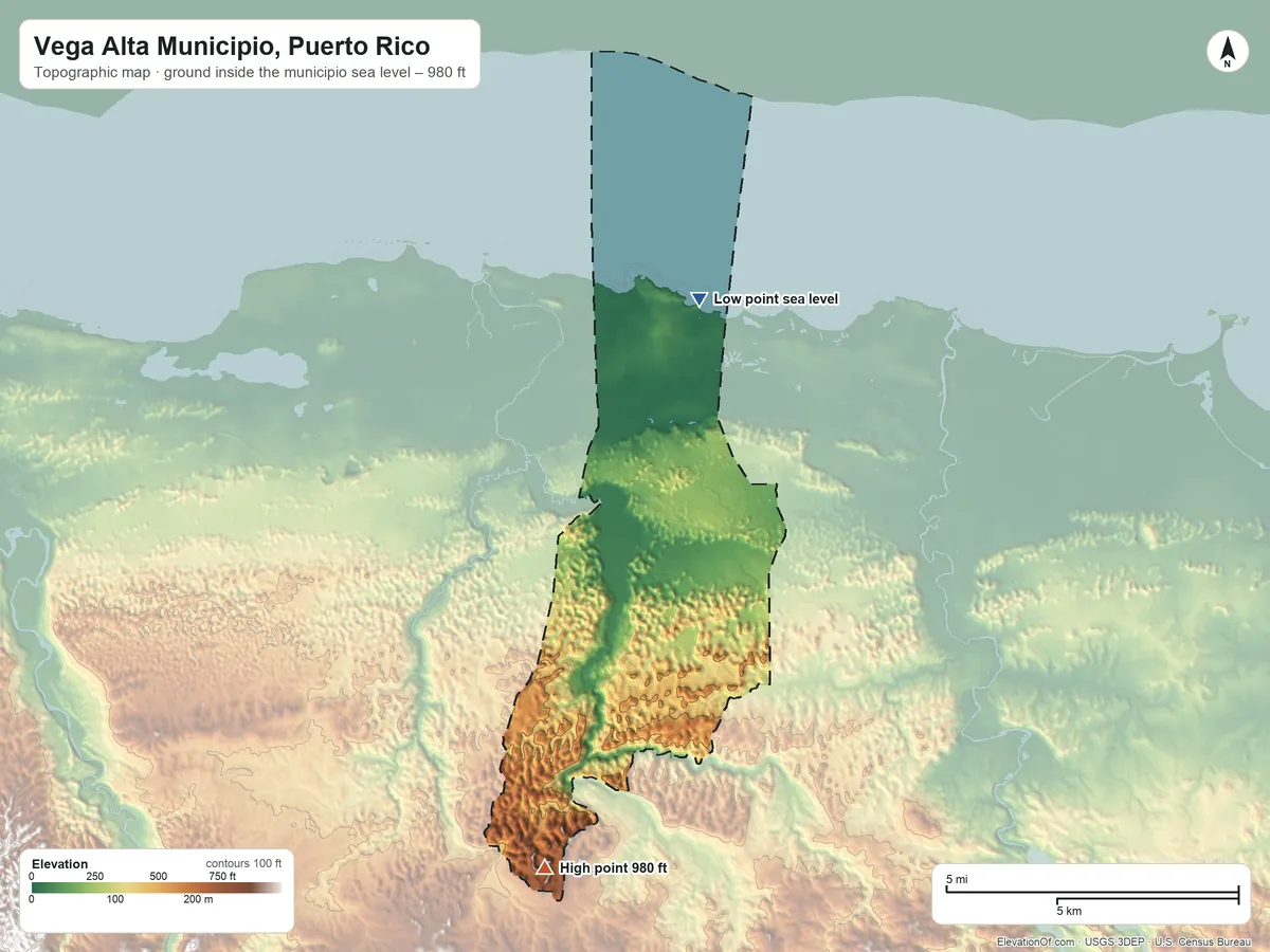 Topographic elevation map of Vega Alta Municipio, Puerto Rico, shaded from sea level on the Océano Atlantico to 980 ft on the south side