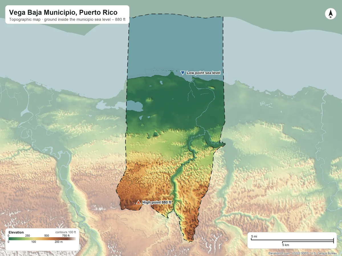 Topographic elevation map of Vega Baja Municipio, Puerto Rico, shaded from sea level on the Océano Atlántico to 880 ft on the southwest side