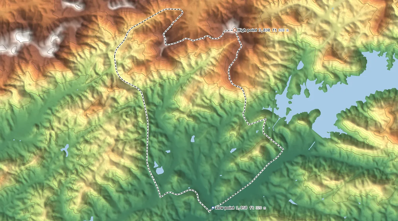 Topographic elevation map of The Cliffs Valley, South Carolina, shaded from 1,050 ft on the south side to 3,026 ft on Corbin Mountain