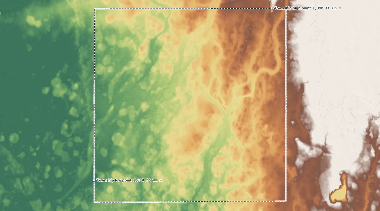 Topographic elevation map of Belle Prairie Township, South Dakota, shaded from 1,310 ft on the southwest side to 1,390 ft on the northeast side