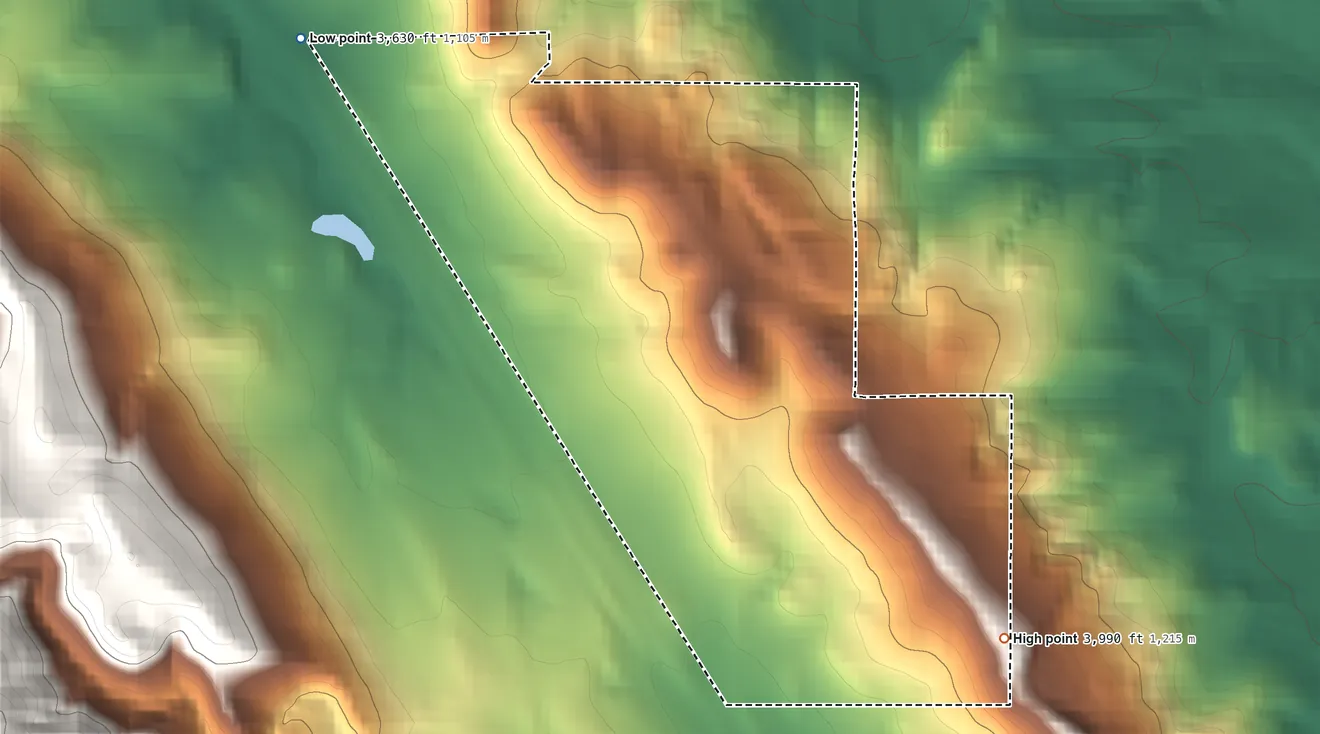 Topographic elevation map of Blucksberg Mountain, South Dakota, shaded from 3,630 ft on the northwest side to 3,990 ft at the foot of the Black Hills