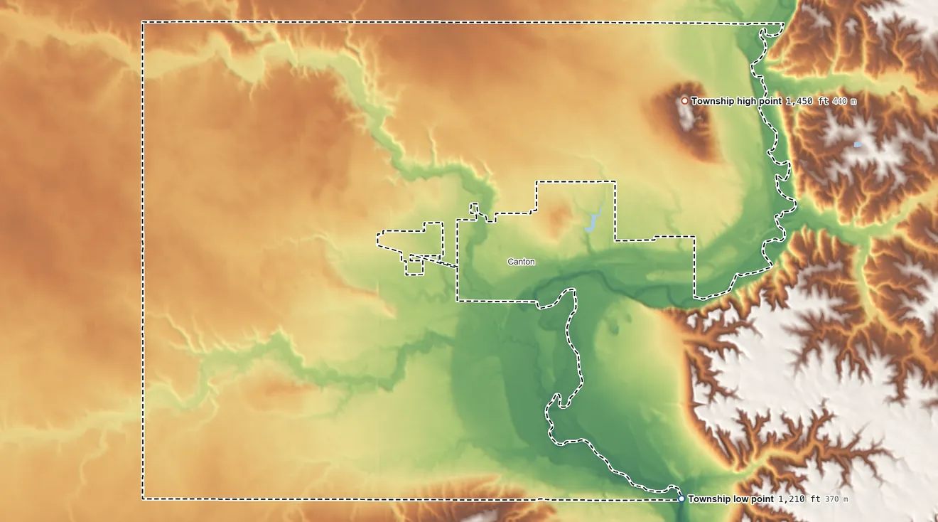Topographic elevation map of Canton Township, South Dakota, shaded from 1,210 ft on the southeast side to 1,450 ft on Canton Mounds