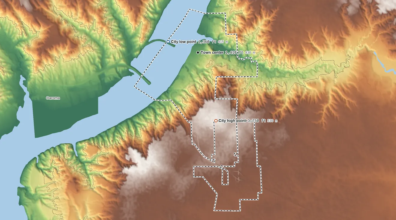 Topographic elevation map of Chamberlain, South Dakota, shaded from 1,360 ft on the west side to 1,750 ft on the south side