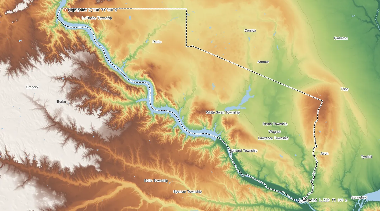 Topographic elevation map of Charles Mix County, South Dakota, shaded from 1,220 ft on the southeast side to 2,130 ft on the northwest side