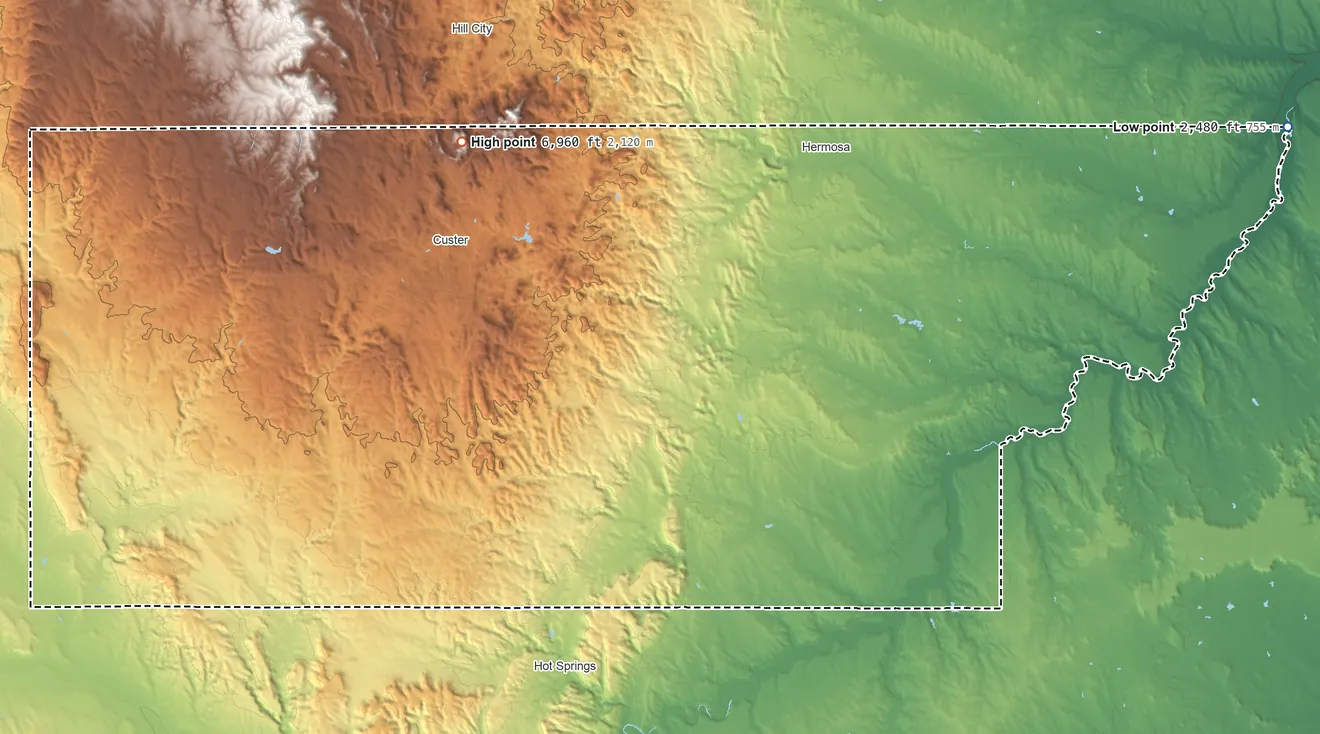 Topographic elevation map of Custer County, South Dakota, shaded from 2,480 ft on the east side to 6,960 ft on the northwest side