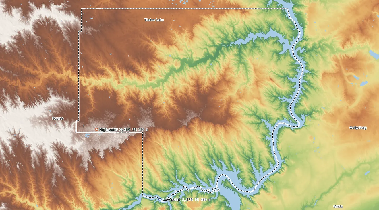 Topographic elevation map of Dewey County, South Dakota, shaded from 1,570 ft on the south side to 2,460 ft on the west side