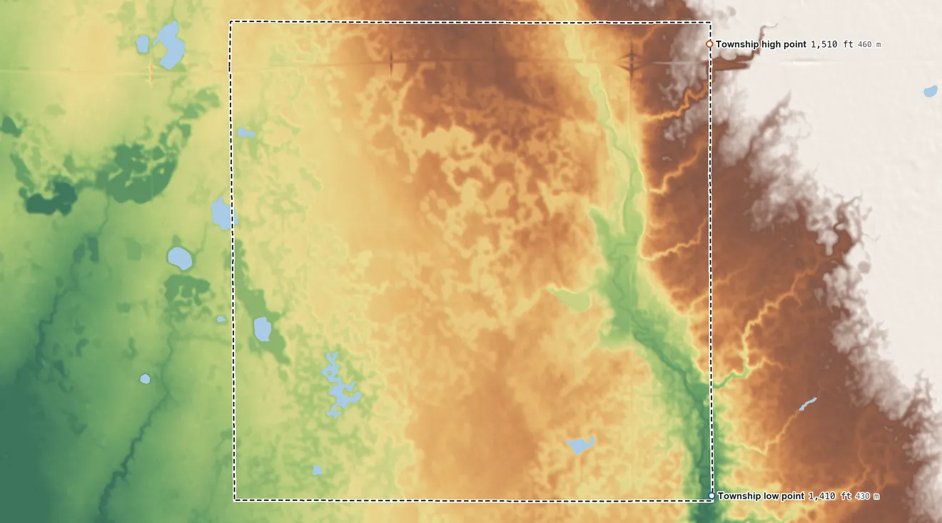 Topographic elevation map of Emery Township, South Dakota, shaded from 1,410 ft on the southeast side to 1,510 ft on the northeast side