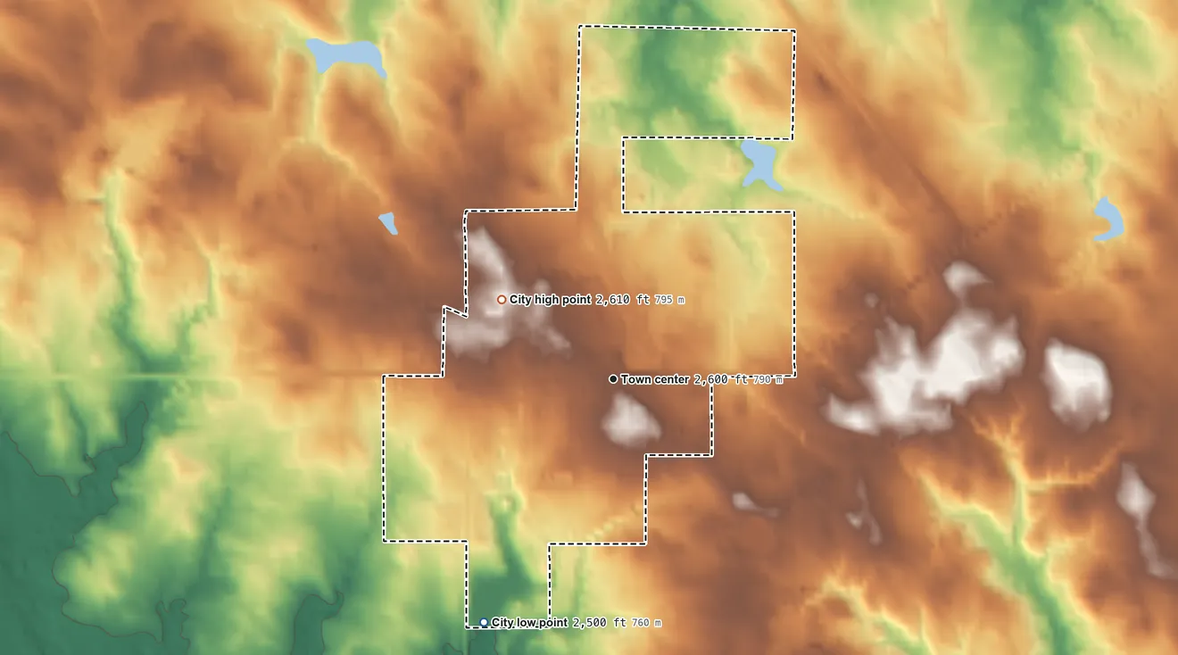 Topographic elevation map of Faith, South Dakota, shaded from 2,500 ft on the southwest side to 2,610 ft on the northwest side