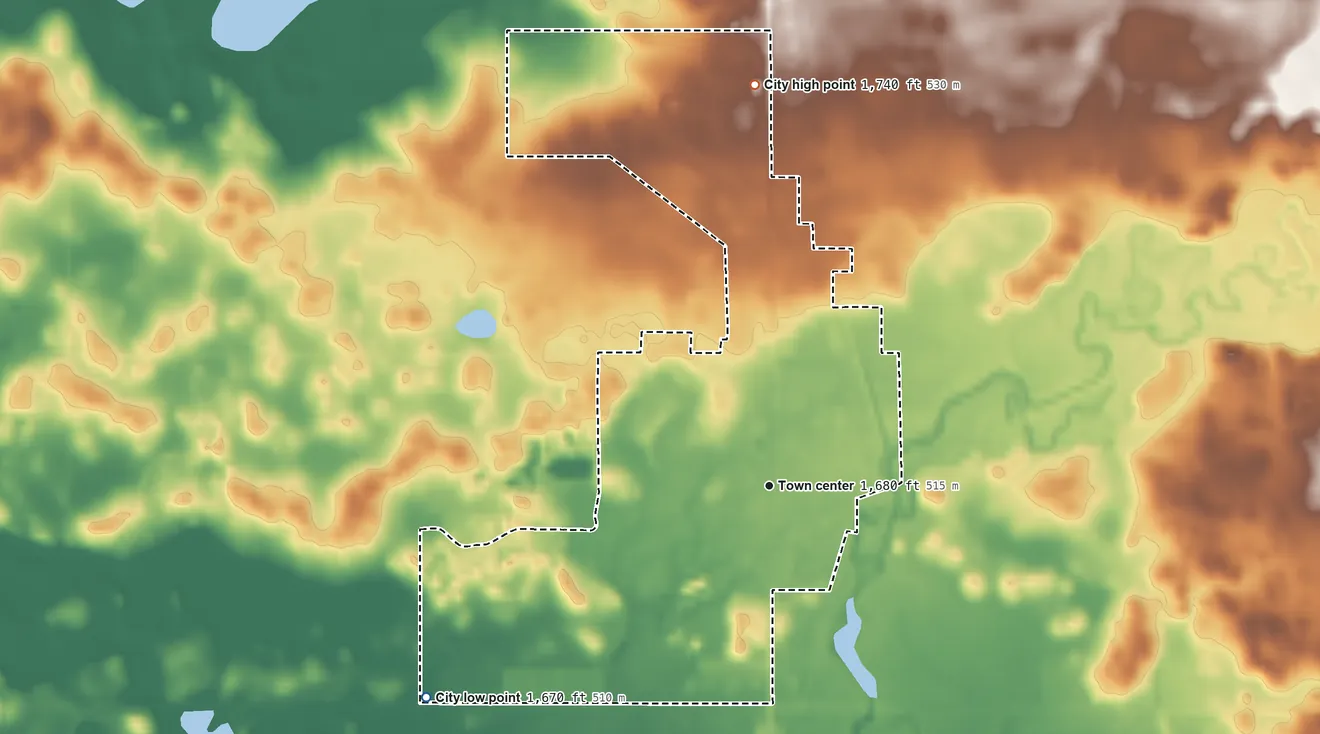 Topographic elevation map of Herreid, South Dakota, shaded from 1,670 ft on the southwest side to 1,740 ft on the north side