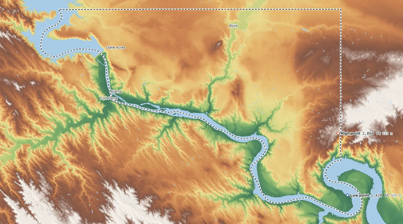 Topographic elevation map of Hughes County, South Dakota, shaded from 1,420 ft on the southeast side to 2,060 ft on the east side