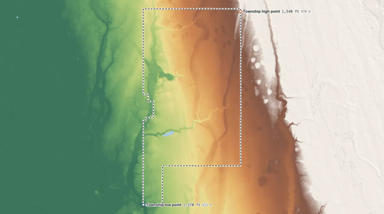 Topographic elevation map of Iroquois Township, South Dakota, shaded from 1,370 ft on the southwest side to 1,540 ft on the northeast side