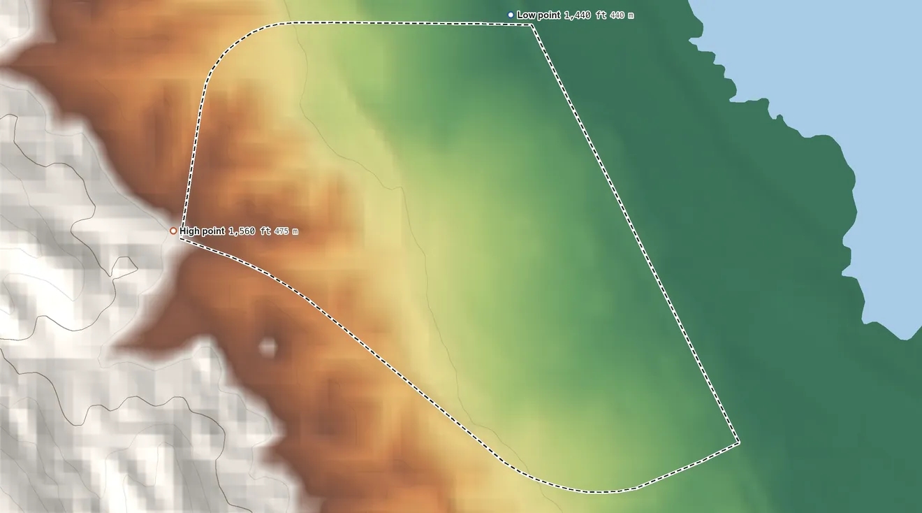 Topographic elevation map of Lower Brule, South Dakota, shaded from 1,440 ft on the north side to 1,560 ft on the west side