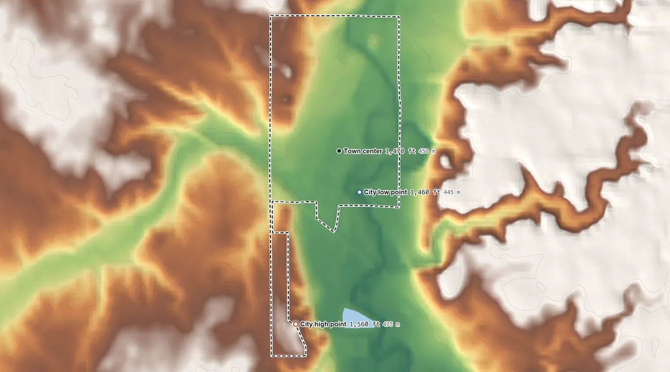 Topographic elevation map of Montrose, South Dakota, shaded from 1,460 ft on the southeast side to 1,560 ft on the south side