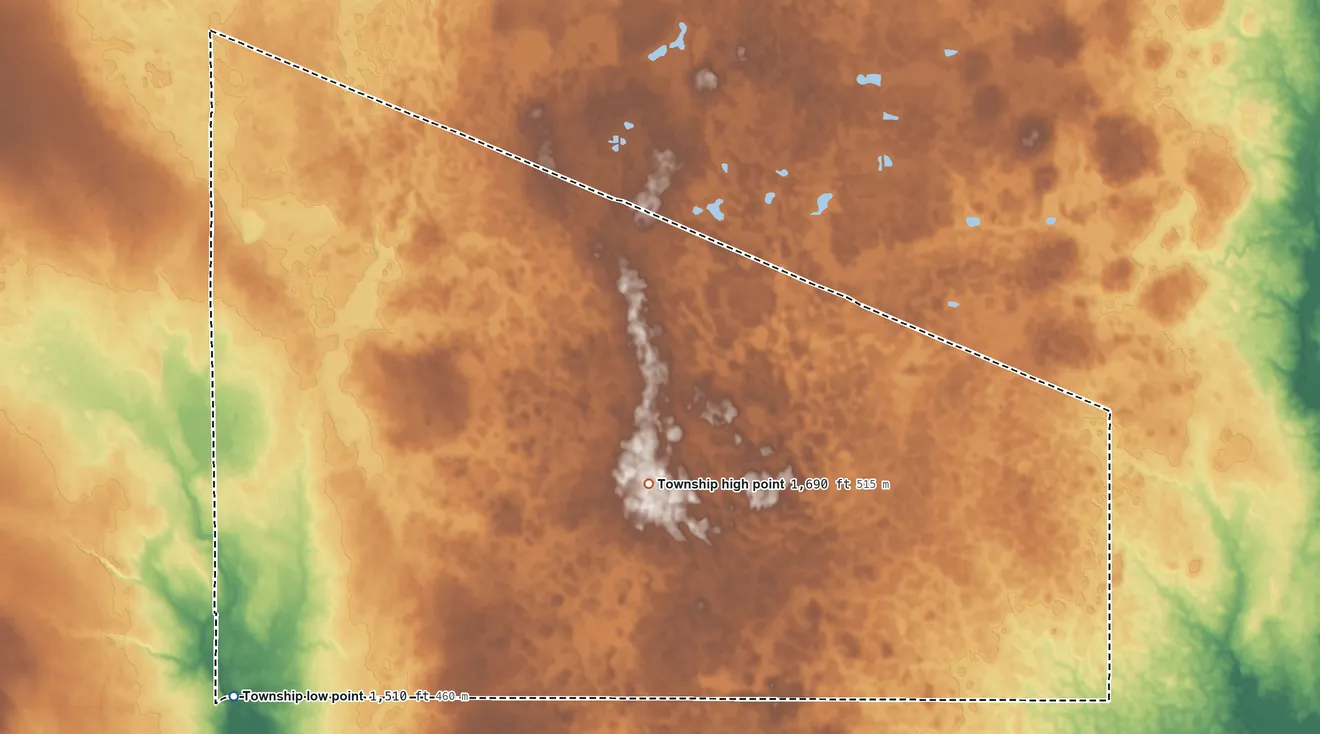 Topographic elevation map of Moore Township, South Dakota, shaded from 1,510 ft on the southwest side to 1,690 ft near the middle