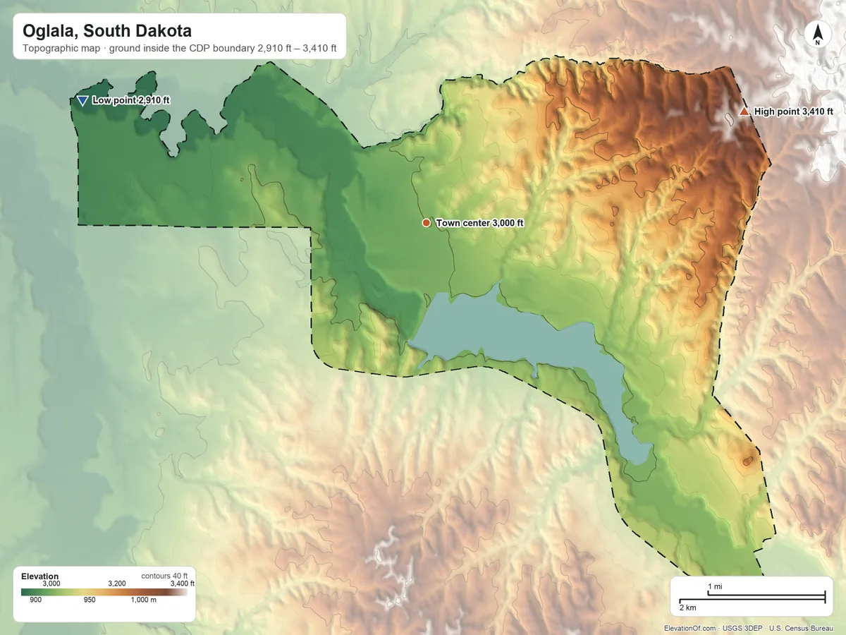Topographic elevation map of Oglala, South Dakota, shaded from 2,910 ft on the west side to 3,410 ft on the east side