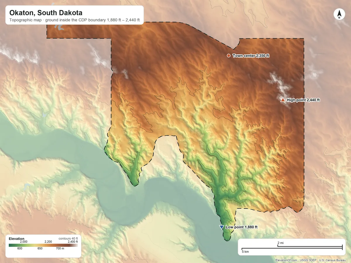 Topographic elevation map of Okaton, South Dakota, shaded from 1,880 ft on the south side to 2,440 ft on the southeast side