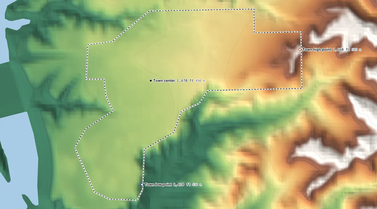 Topographic elevation map of Pickstown, South Dakota, shaded from 1,410 ft on the south side to 1,660 ft on the east side