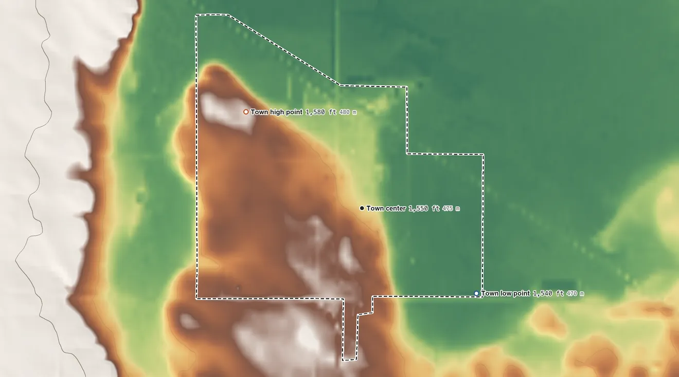Topographic elevation map of Pukwana, South Dakota, shaded from 1,540 ft on the southeast side to 1,580 ft on the northwest side