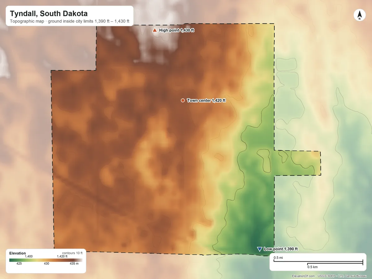 Topographic elevation map of Tyndall, South Dakota, shaded from 1,390 ft on the southeast side to 1,430 ft on the north side