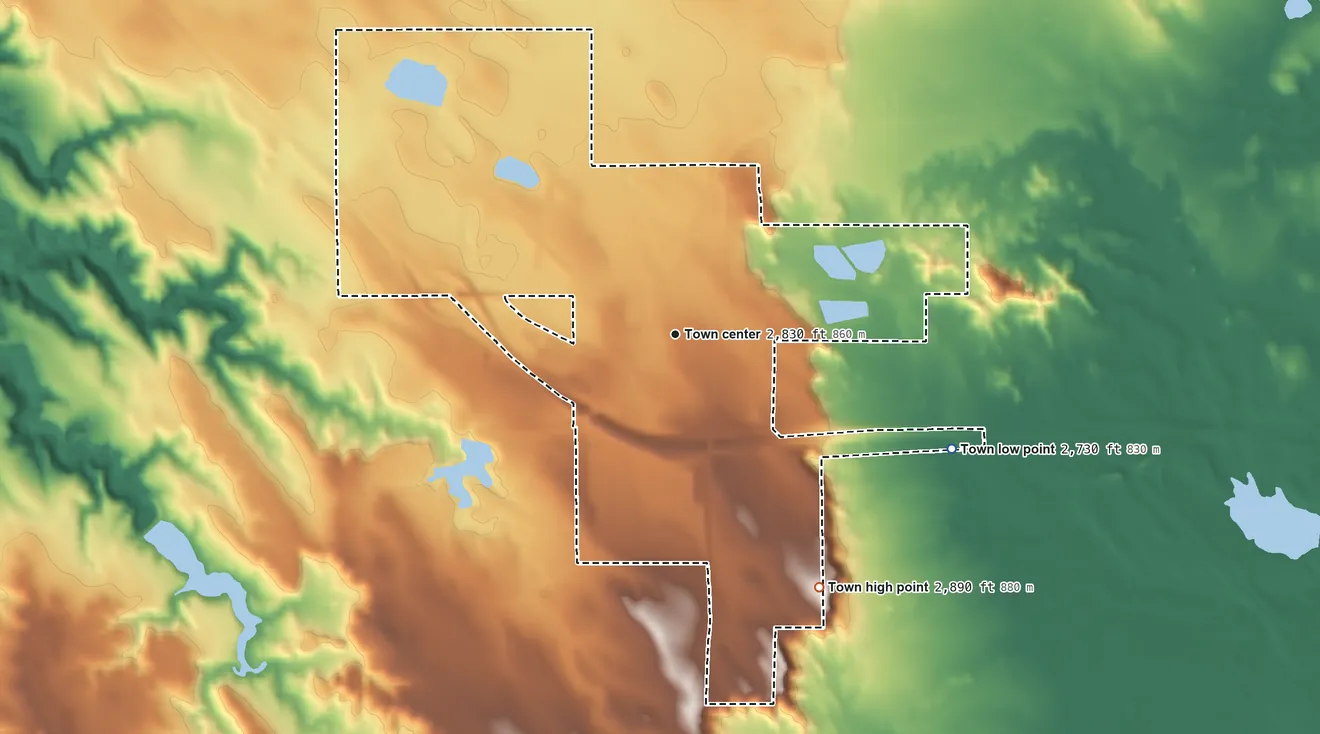 Topographic elevation map of Wall, South Dakota, shaded from 2,730 ft on the southeast side to 2,890 ft on the southeast side