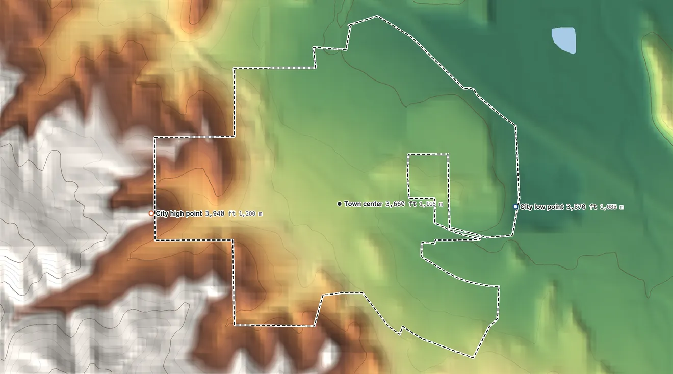 Topographic elevation map of Whitewood, South Dakota, shaded from 3,570 ft on the east side to 3,940 ft at the foot of the Black Hills