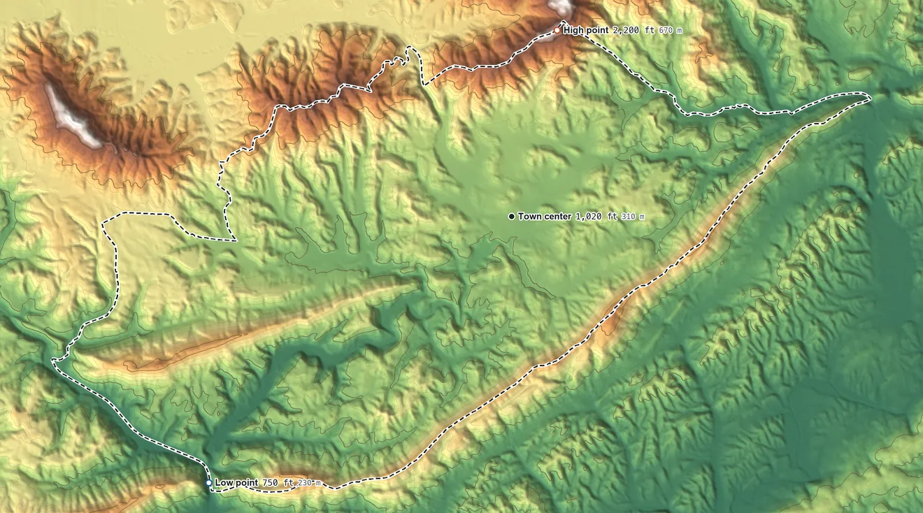 Topographic elevation map of Coalfield, Tennessee, shaded from 750 ft on the southwest side to 2,200 ft on the north edge, below higher ground just outside
