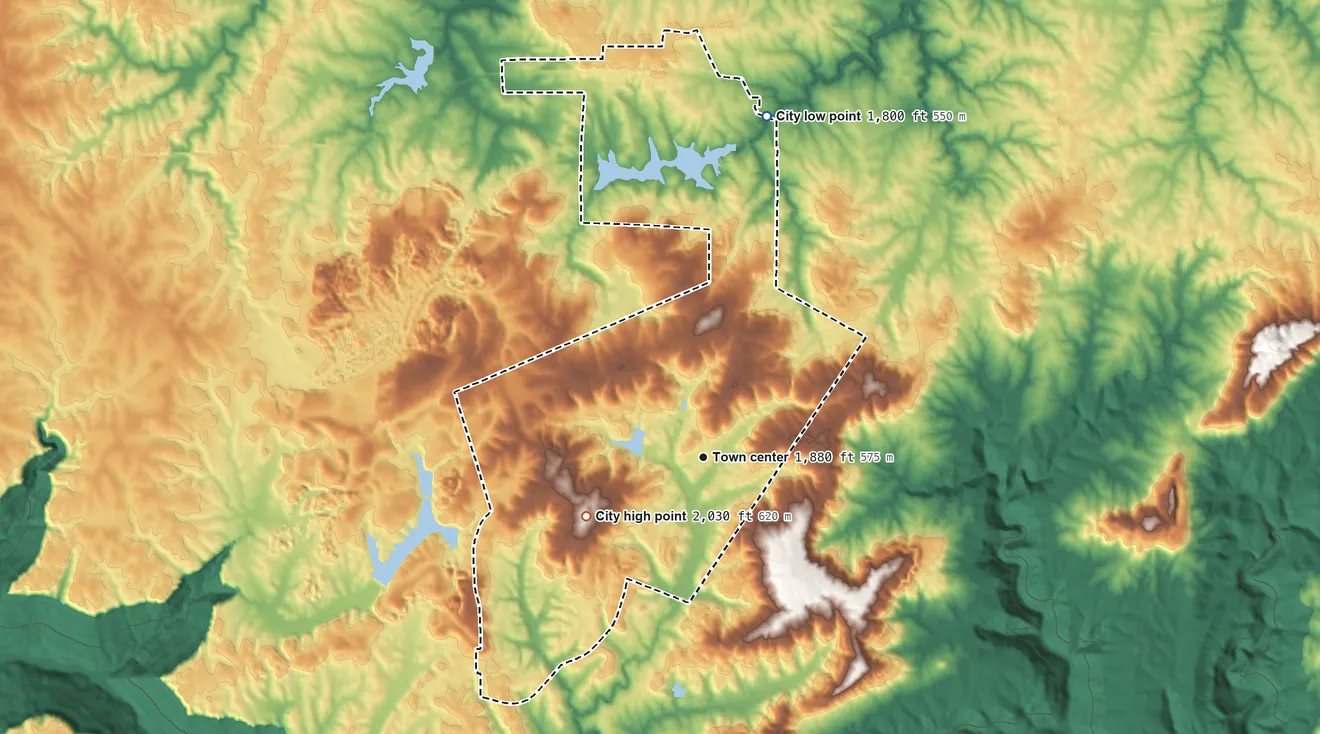 Topographic elevation map of Coalmont, Tennessee, shaded from 1,800 ft on the north side to 2,030 ft on the southwest side