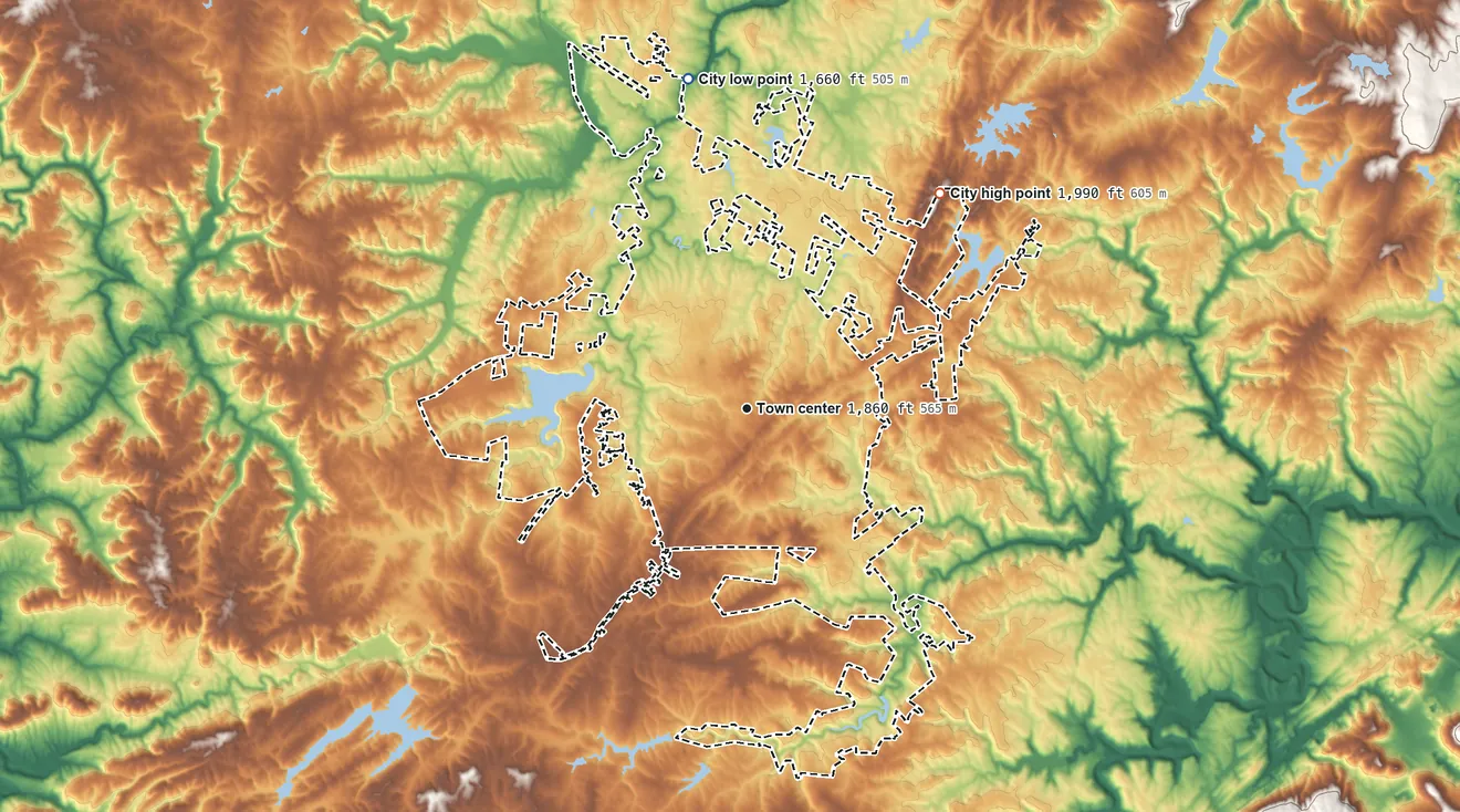 Topographic elevation map of Crossville, Tennessee, shaded from 1,660 ft on the north side to 1,990 ft on the northeast side