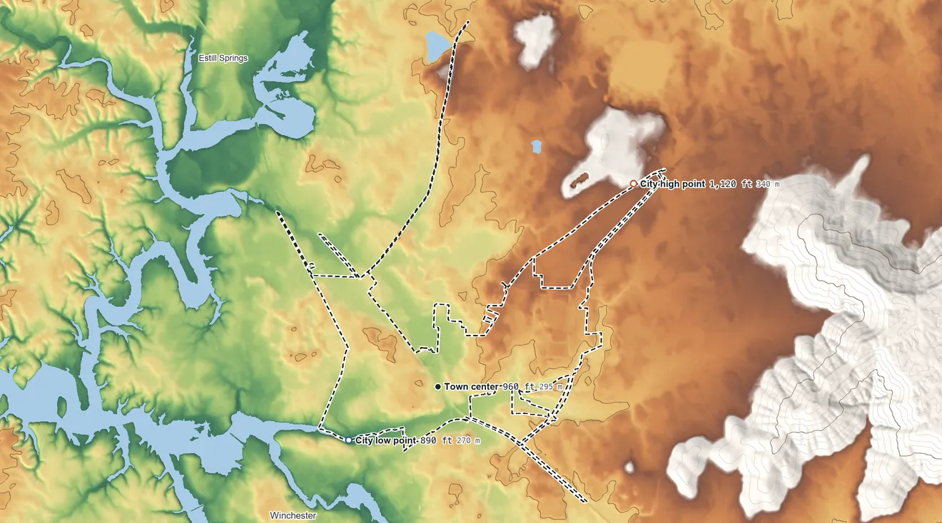 Topographic elevation map of Decherd, Tennessee, shaded from 890 ft on the southwest side to 1,120 ft on the northeast edge, below higher ground just outside