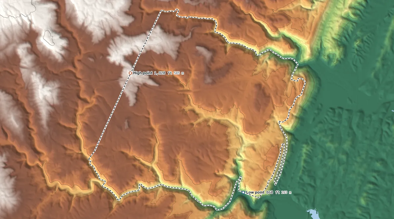 Topographic elevation map of Flat Top Mountain, Tennessee, shaded from 860 ft on the south side to 1,920 ft on the west side