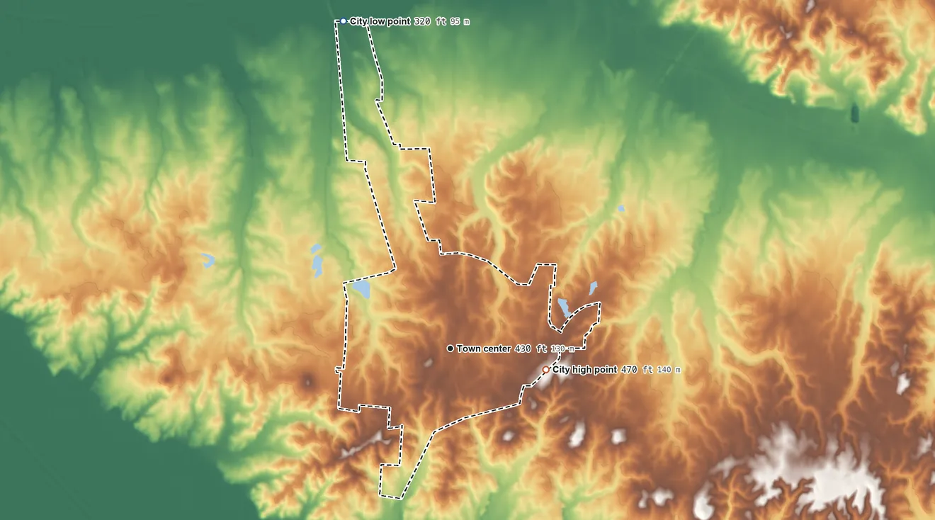 Topographic elevation map of Greenfield, Tennessee, shaded from 320 ft on the north side to 470 ft on the east side