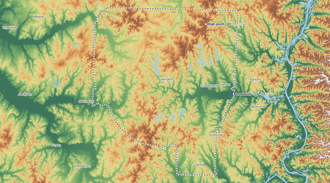 Topographic elevation map of Henderson County, Tennessee, shaded from 370 ft on the east side to 700 ft on the northeast side
